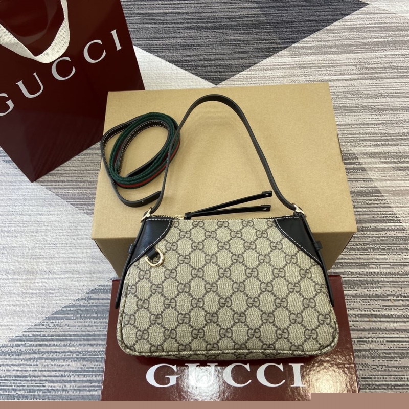 G*u*i top handle bags